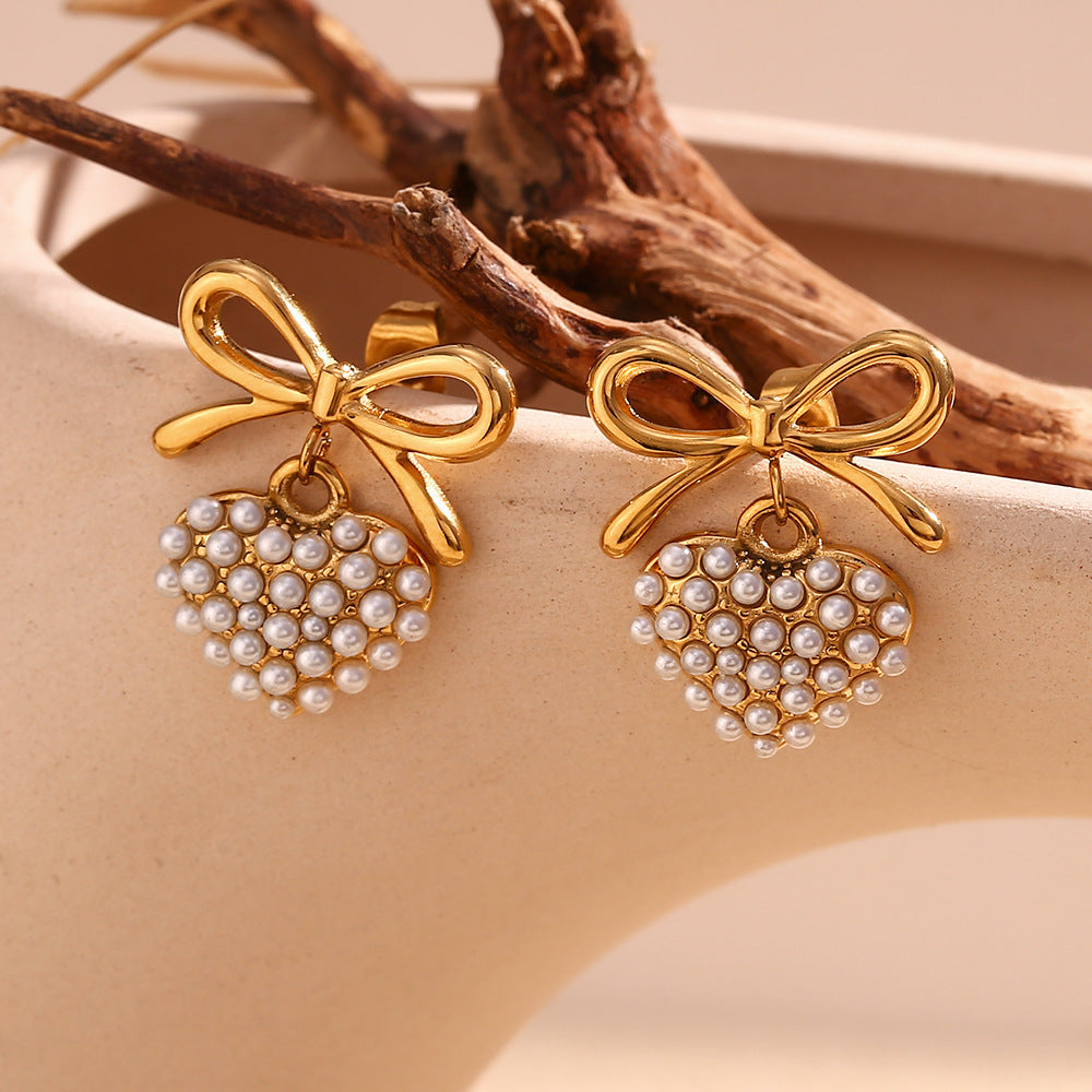 In love bow heart pearl earrings