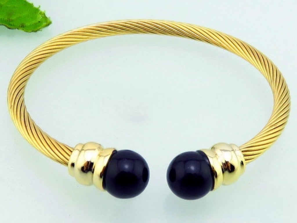 Gold tone black pearls wire bracelet