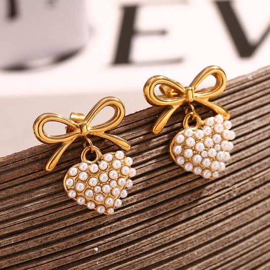 In love bow heart pearl earrings